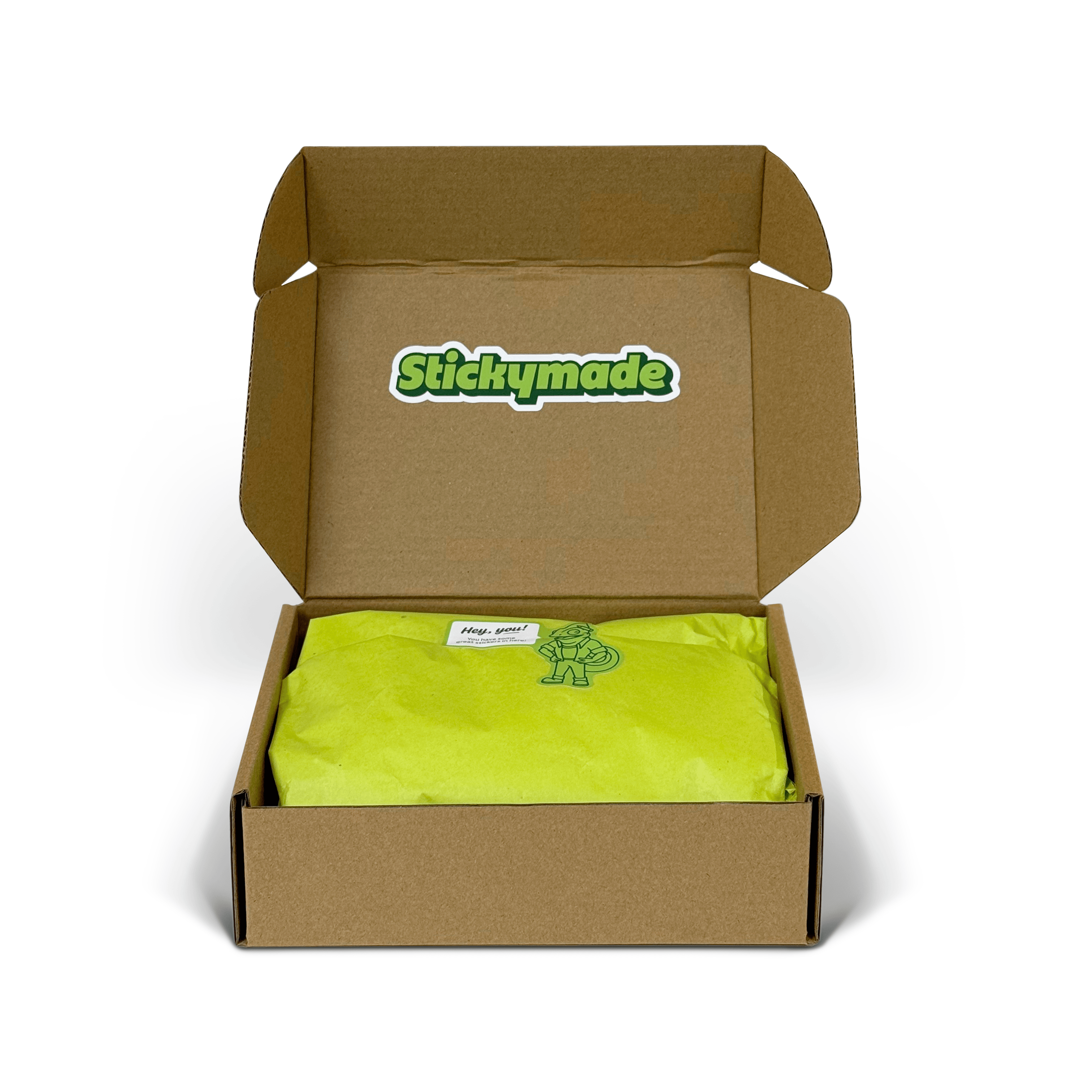 Open cardboard box with a green product inside, featuring the 'Stickymade' brand.