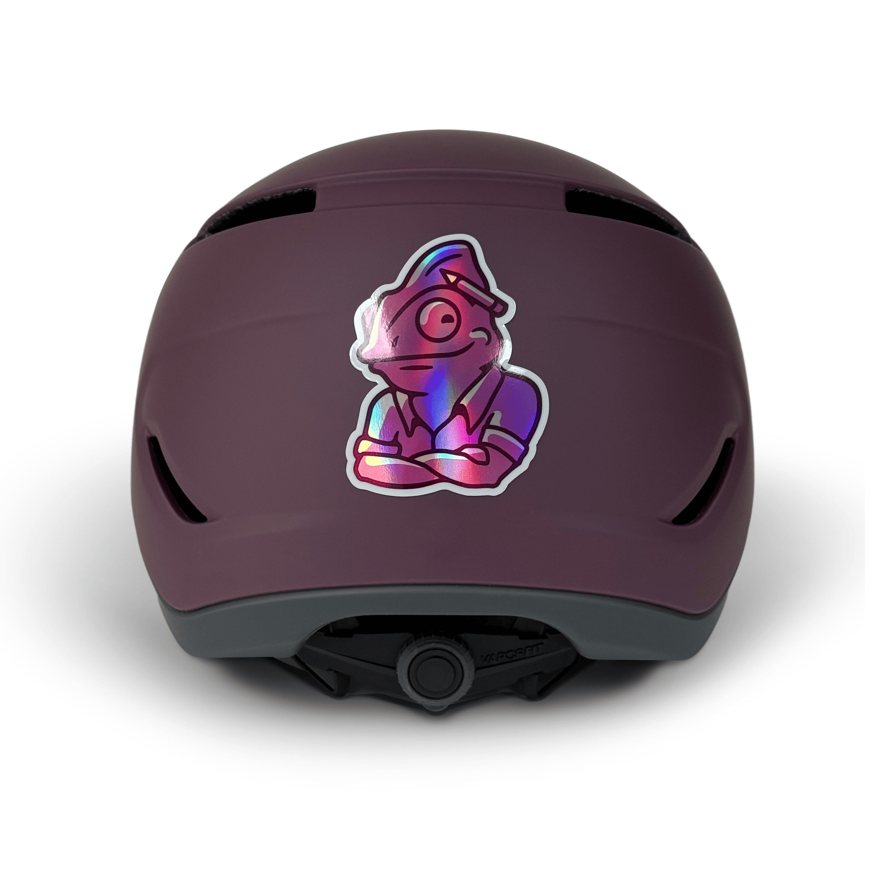 Purple helmet with a colorful sticker on a white background